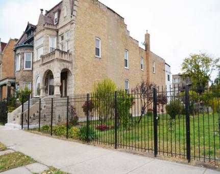 empty lot in Chicago next to a house